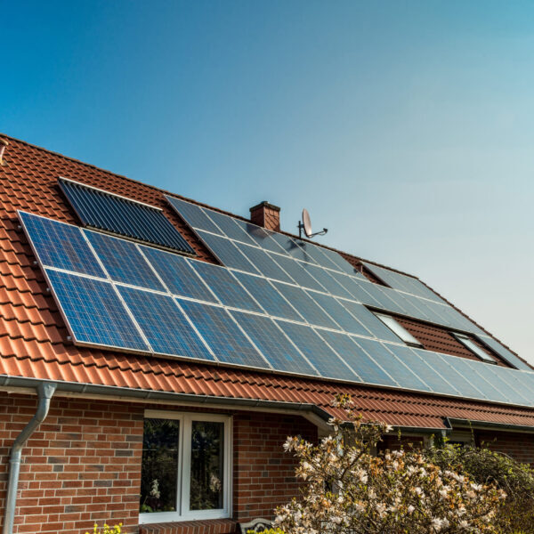 Solar panel on a red roof